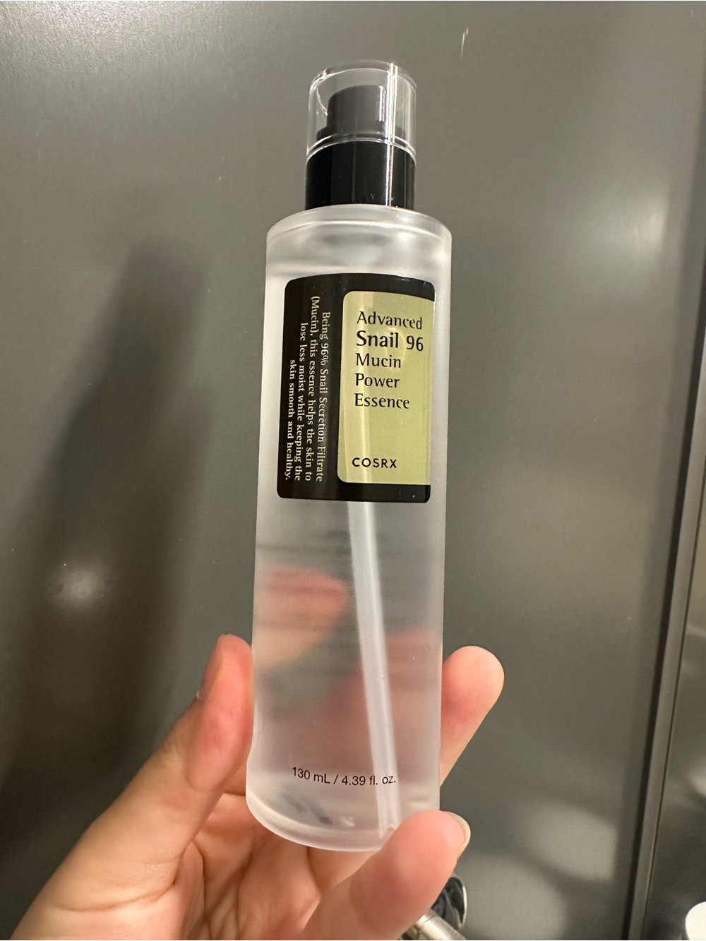 COS Clear Frosted Bottle with Black Pump Facial Essence